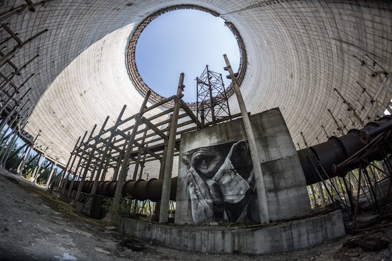 Fisheye lens captures graffiti inside an abandoned Chernobyl reactor.